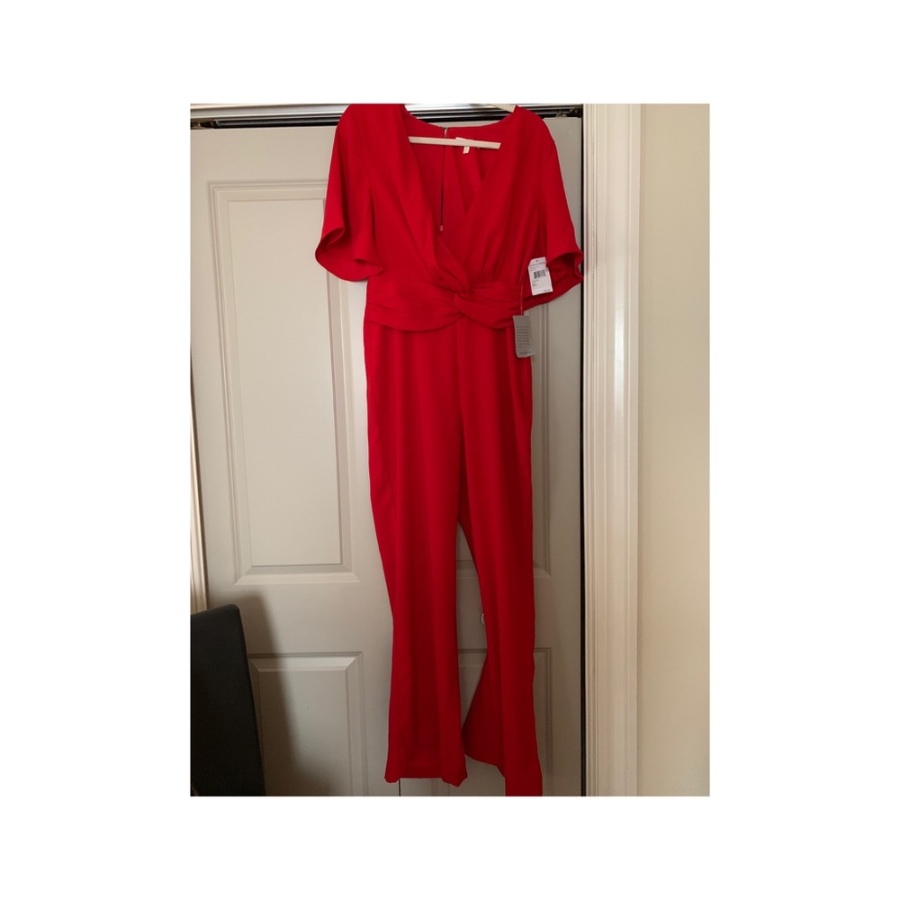 Red jump suit